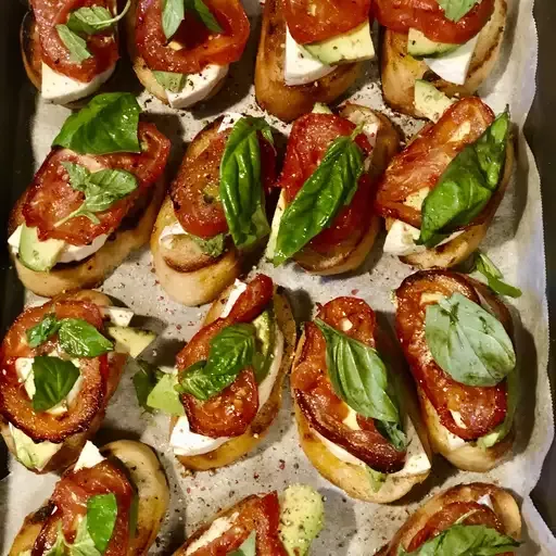 Roasted Tomato, Avocado, and Fresh Mozzarella Crostini