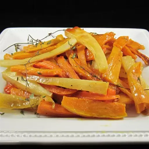 Roasted Sweet Potatoes and Vegetables With Thyme and Maple Syrup