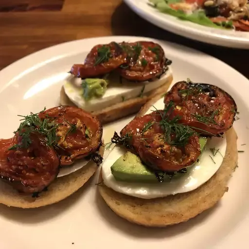 Roasted Tomato, Avocado, and Fresh Mozzarella Crostini