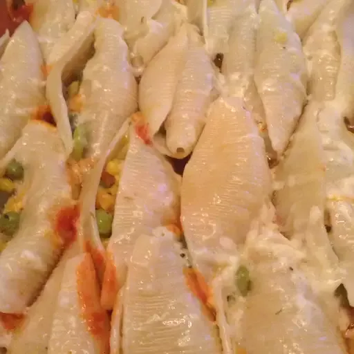 Jumbo Shells with Asparagus, Prosciutto, Ricotta Cheese and Three Cheese Sauce